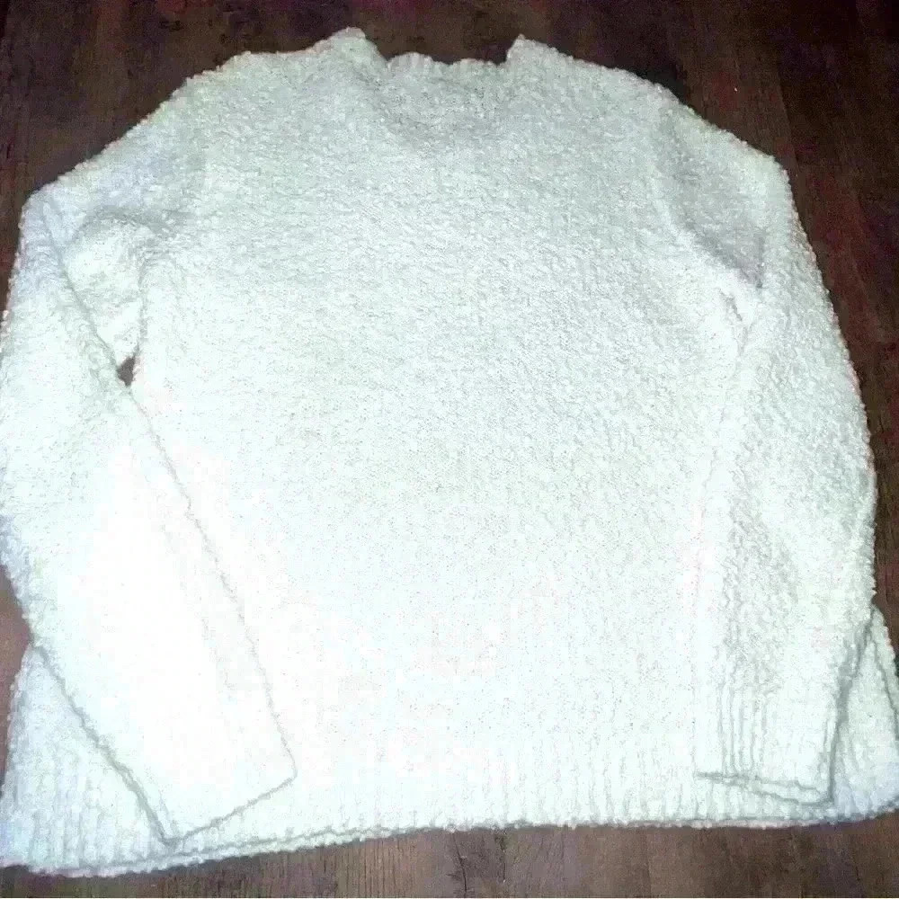 Marled soft white knotted sweater